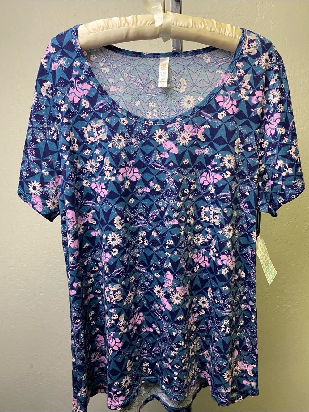 LuLaRoe Teal and Navy Geometric Floral Scoop Neck Tee